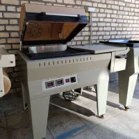 دستگاه شیرینگ پک کابینی بسته بندی