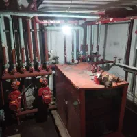 تاسیسات موتورخانه. شوفاژ پکیج نصب پمپ اب