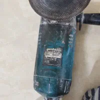 یک عدد سنگ فرز ویک عدد دستگاه جوش