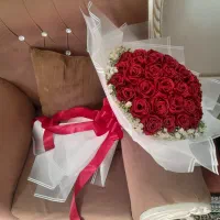 دسته گل روبانی و‌ شمع تزئینی