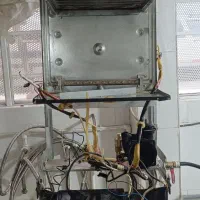 تعمیر و نصب کولر گازی.یخچال.ساید. لباسشویی پکیج
