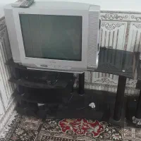 زیر تلویزیون شیشه ای