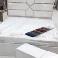 تخت خواب دو نفره در حد نو لمسه پارچه ای