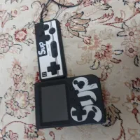 یه دستگاه کنسول بازی سالم با چهارصد تا بازی