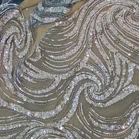 تیکه پارچه کار دست مجلسی برای خرجکار لباس
