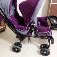 کالسکه دو قلو کودک رودهن