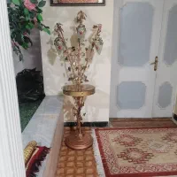 یه سری وسایل دکوری و ساعت  میز جلو مبلی در کرمان