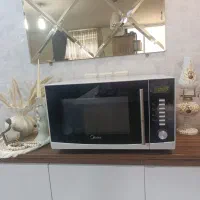 ماکروفر مدیا نو نو همراه با دفترچه راهنما