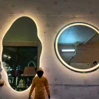 اینه گرد و‌ دفورمه قدی العیدی دار