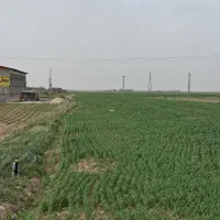 زمین صنعتی لب جاده قروه بطرف سنندج بعدازپل جنیان
