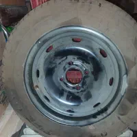 زاپاس پژو و تعدادی اوازم پراید و روغن و فیلتر