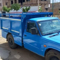 حمل بار با نیسان کمپرس دار مدل بالا با کارگر