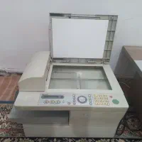 پرینتر و دستگاه فکس و ماشین حساب شارپ