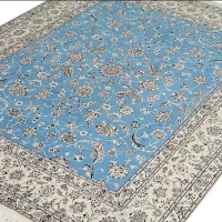 فرش دستبافت ۵.۵ متری نایین اصل ۶لا گل ابریشم آبی