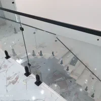 اجرای نرده شیشه‌ای سکوریت و لمینت