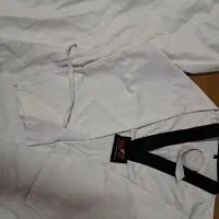 لباس و شلوار تکواندو و کمربند سفید به فروش میرسد
