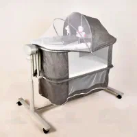 گهواره برقی برند کول بی بی و بالشت شیردهی کاملا نو