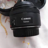 لنز ۵۰ فیکس کانن f1.8 درحد آکبند با کیف دوربین