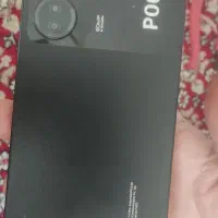 پوکوc65|موبایل|درمیان, |دیوار