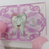 بنر  و استند چوبی طرح دندونی  صورتی  اجاره