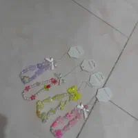 آویز گوشی کار دست