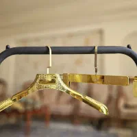 چوب کار لباس فروشگاهی