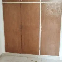 چهارچوب کمد دیواری با درب چوبی