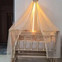 گهواره و تخت کنار مادر آنجل لند