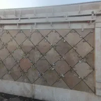 اجرای نما ساختمان سنگ وسفال نسوز