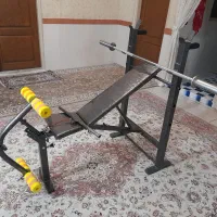 دستگاه بدنسازی همراه وزنه و هالتر و دمبل