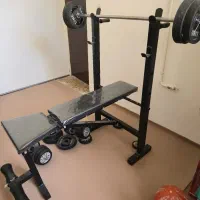 دستگاه چند کاره بدنسازی به همراه وزنه و دمیبل
