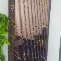 پرده آویز چوبی ریسه ای