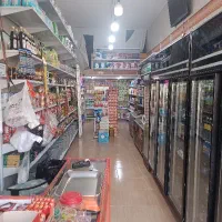 فروشنده خانوم سوپرمارکت