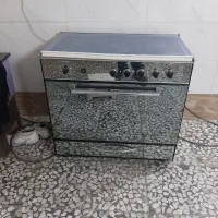 اجاق گاز طرح فر لعاب درحد نو نو تشگاز