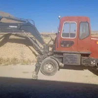 مینی بیل چرخ لاستیکی