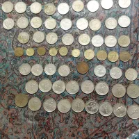تعدادی سکه مبلغ 5ملیون تومان