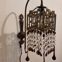 یک عدد دیوار کوب برنزی