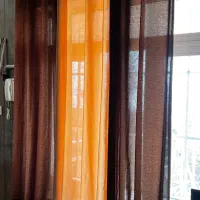 دو عدد پرده پانچ همراه با میله پرده چوبی