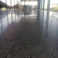 بتن ریزی کف با ماله پروانه ای