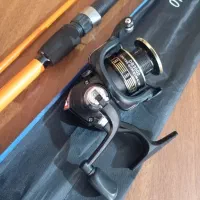 چوب ماهیگیری دو تکه و چرخ اسپنینگ