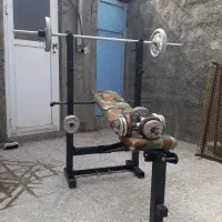 میز پرس سینه هارتر  دمبل درحد نو به همراه ۴۰ کیلو