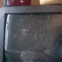 تلویزیون پاناسونیک وآسیاب قدیمی سنگی وآفتابه مسی