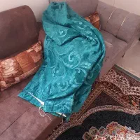 کنار پردی مخمل با چوب پرده