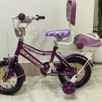 دوچرخه در حدنو‌سایز ۱۲با کمکی