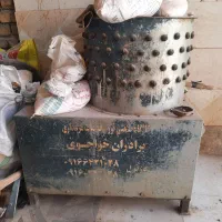 وسایل مرغ فروشی دستگاه پرکن قفس دونخوری