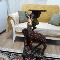 میزتلویزیون ومجسمه