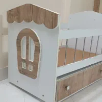 تخت گهواره ای نوزاد