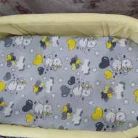 گهواره تخت کنار مادر