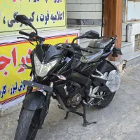 ns 200 95|موتورسیکلت|آفتاب, |دیوار