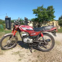سوزوکی ax100